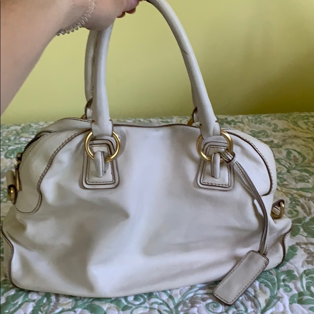 White leather handbag